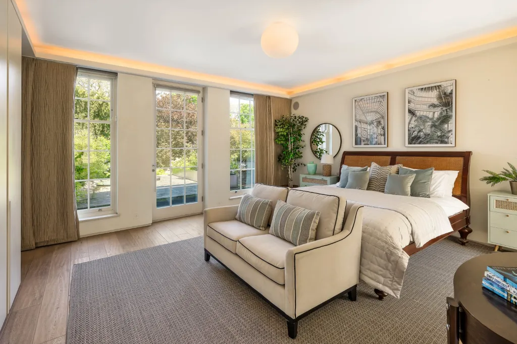 a bedroom in a luxury property for sale in Holland Park, London